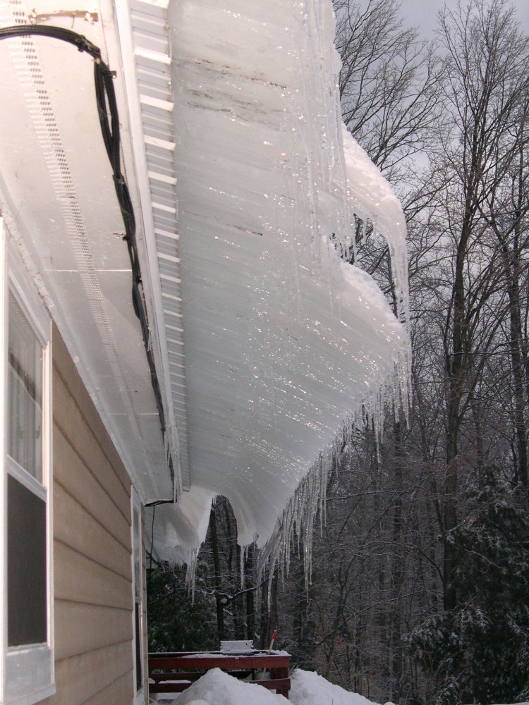 Ice sliding off the metal roof