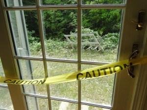 glass door with caution tape glass slider with caution tape