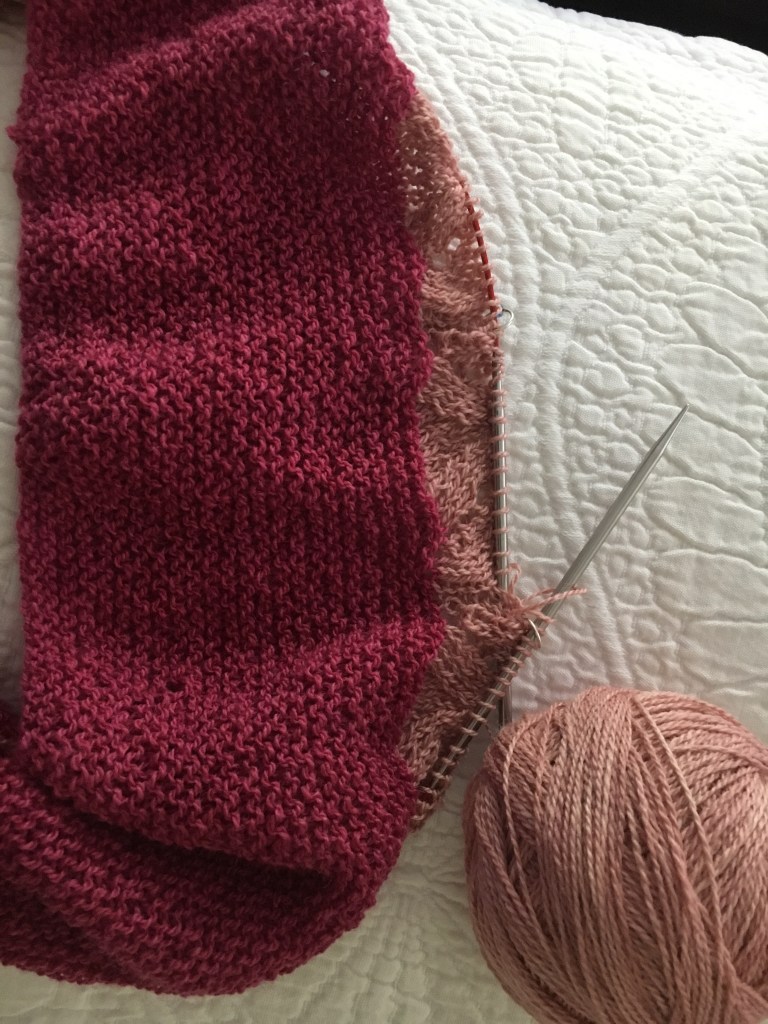 knitting a cowl in shades of pink