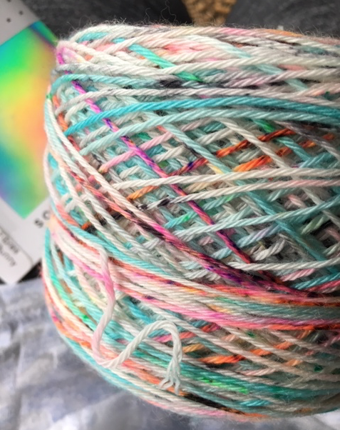 Beach bunny variegated yarn purchased at Wool and Company where the skein was wound for free.