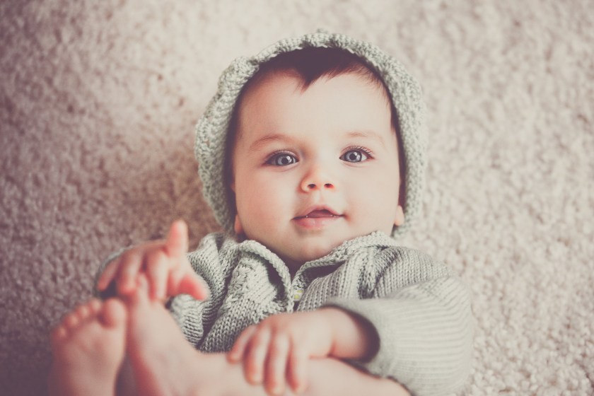 Baby in hat and sweater