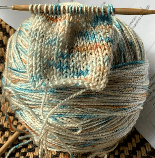 Knitting a baby sweater