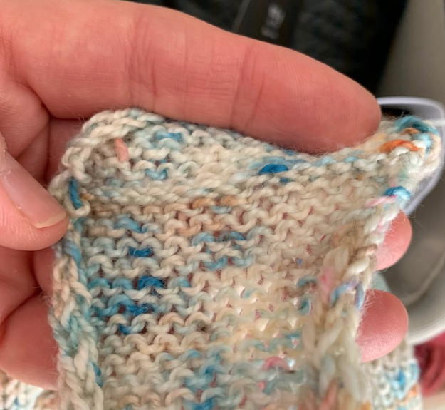 Ridge on wrong side of kitchener stitch