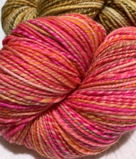 Bright pink handspun yarn