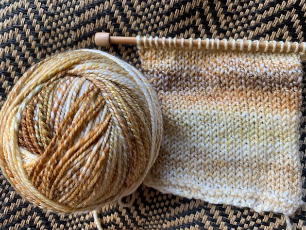 Handspun swatch in tan variegated