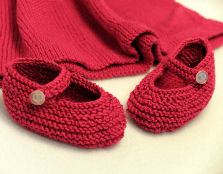 Red baby booties hand knit