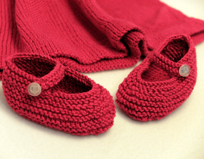 Red baby booties hand knit