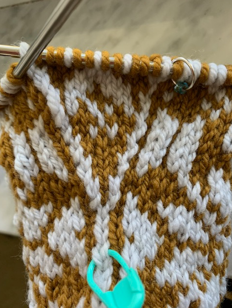 Thumb stitches on mitten knitting