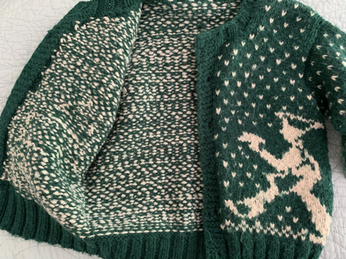 Inside floats of stranded knitting on child's sweater