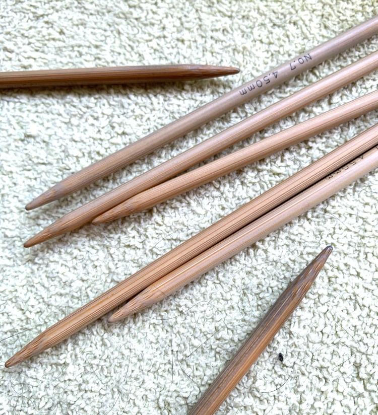 Bamboo needles turning blue from yarn dye