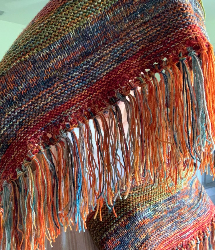 Fringe on orange Moon Sisters shawl