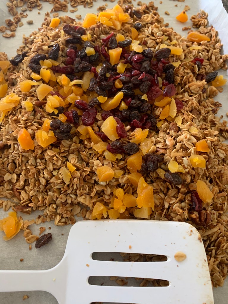 Mixing fruit into my homemade granola