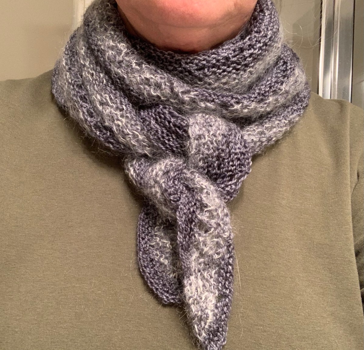 Railings crescent shaped scarf tied around my neck
