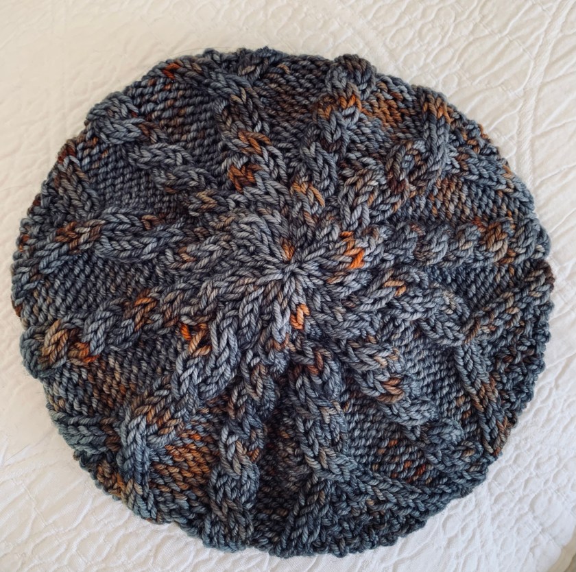 Top of Skiff beanie with cables