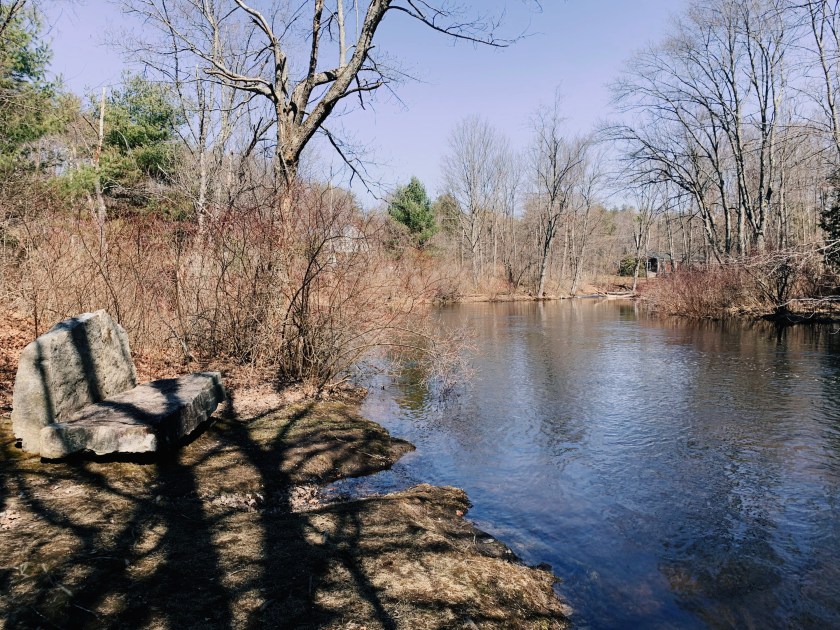 Stone seat by the brook in New Hampshire