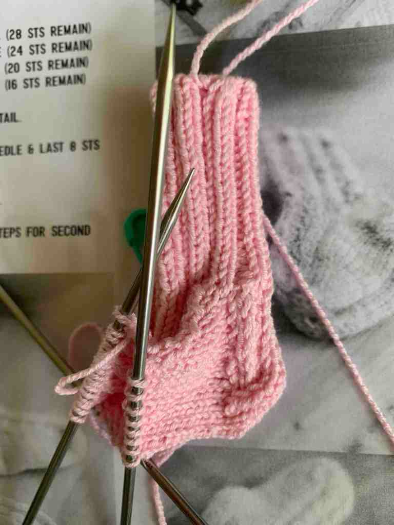 Three needles to knit foot of sock