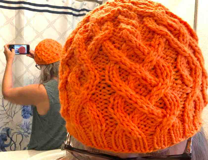 getting the shot newly knit cabled beanie