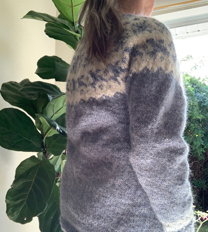 wearing newly knit pullover side view