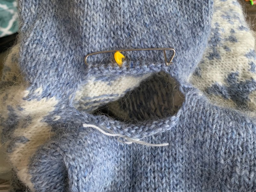 Armpit hole in sweater stitches on hold