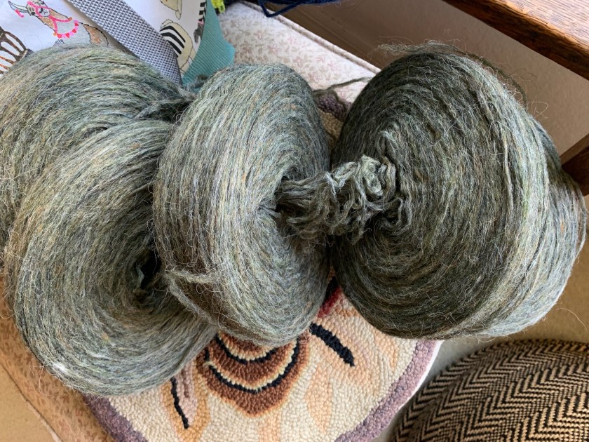 Plotulopi Frost Grass green plates of yarn