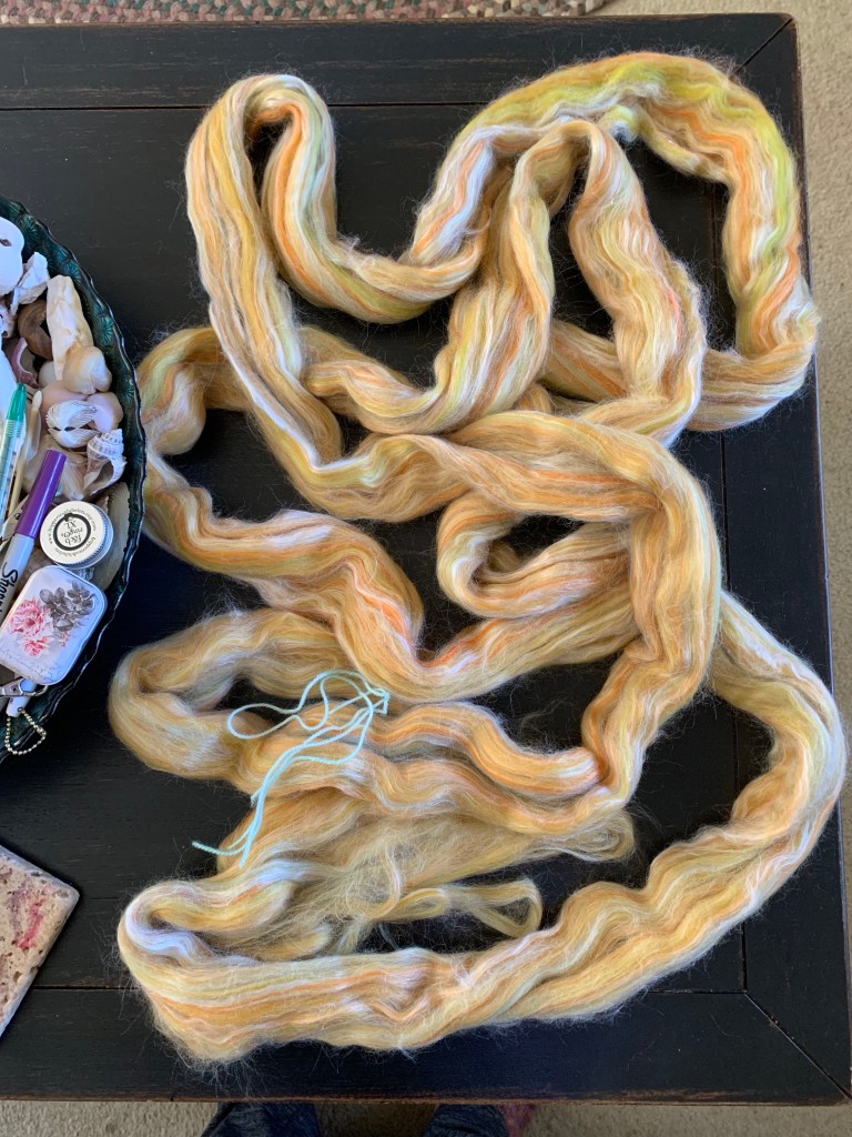 Roving in yellow to do thrummed mittens