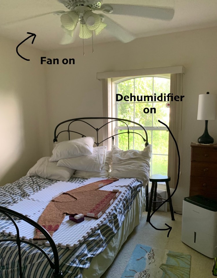 Drying my wool sweater in Florida on a spare bed