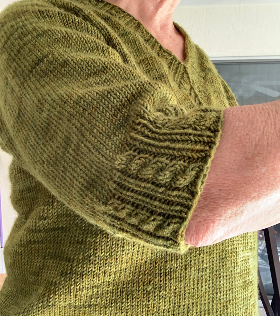 Cable and rib sleeve cuff