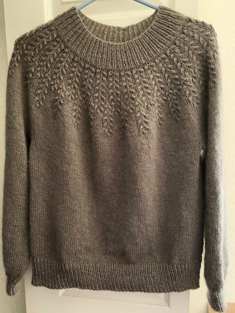 Field sweater on hanger
