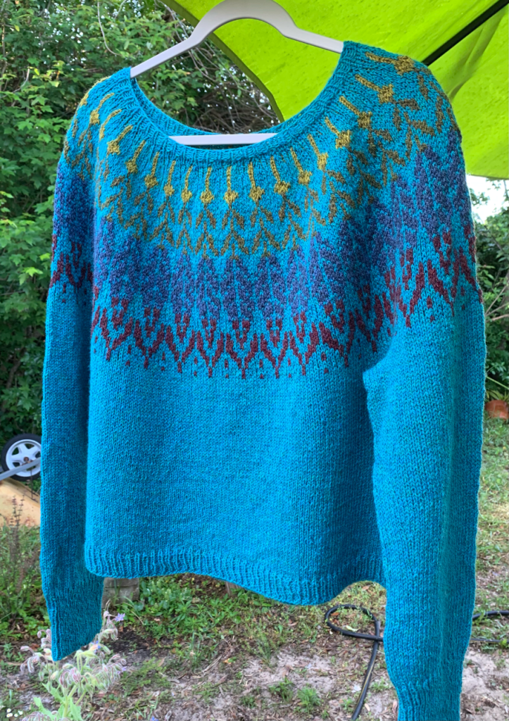 Solvi sweater in peacock blue wool