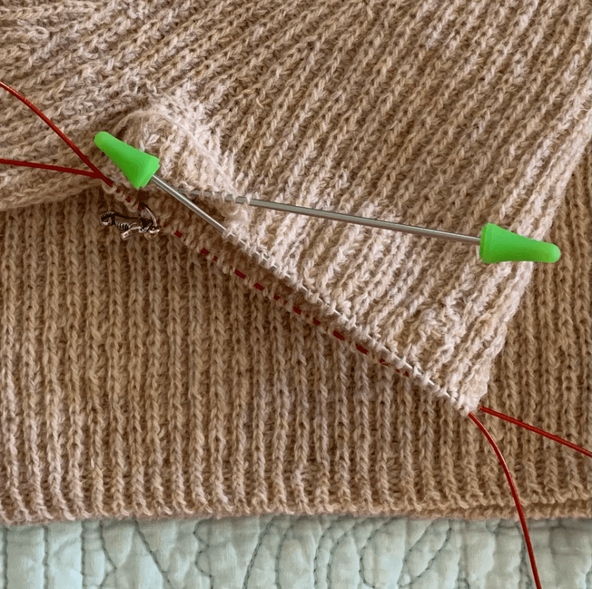 Knitting a sleeve on the Birthday61 sweater.