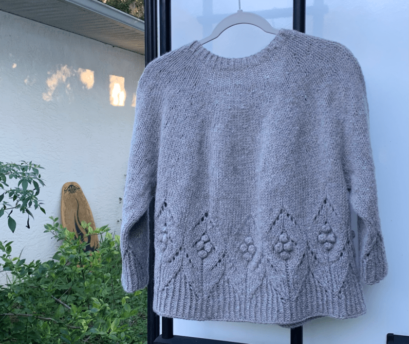 Back design of lace and bobbles