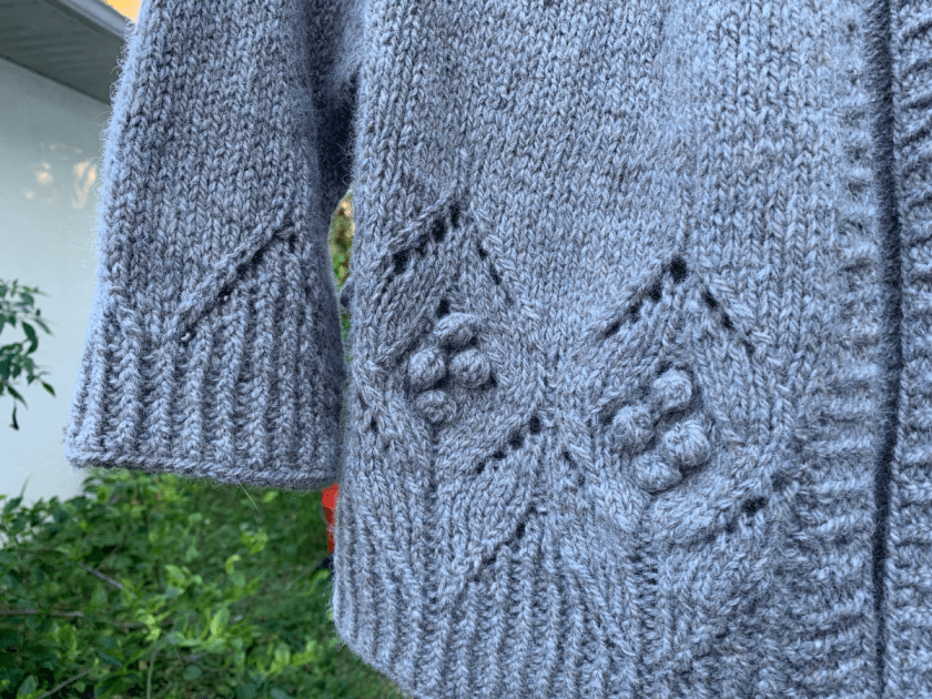 Lace and bobbles and hem, with sleeve of Magnolia Chunky Cardigan