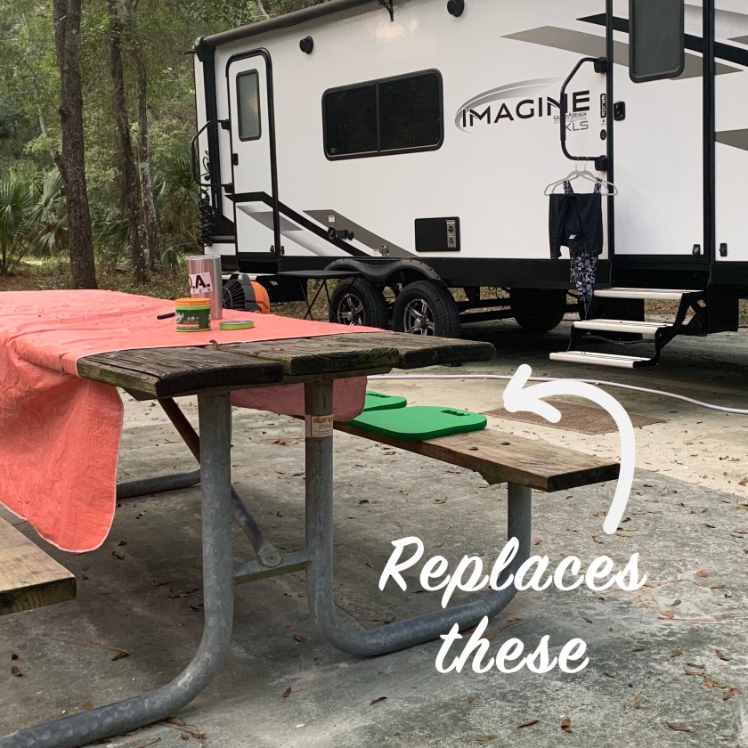 camping chair pads on picnic table