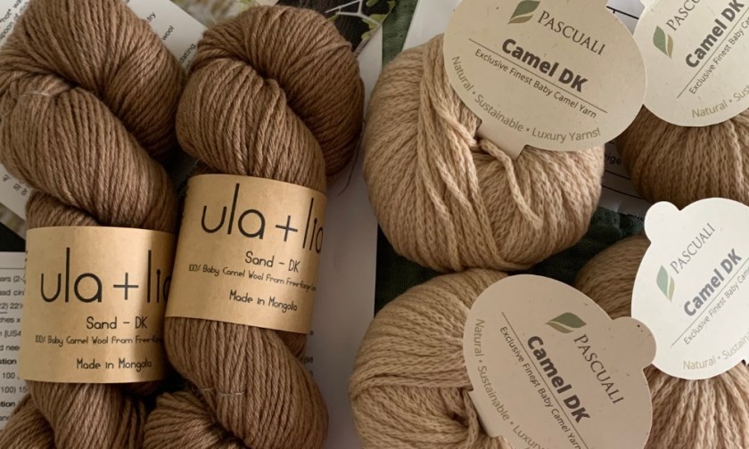 Light tan camel hair yarn by Pascuali and darker skeins by ula+lia.